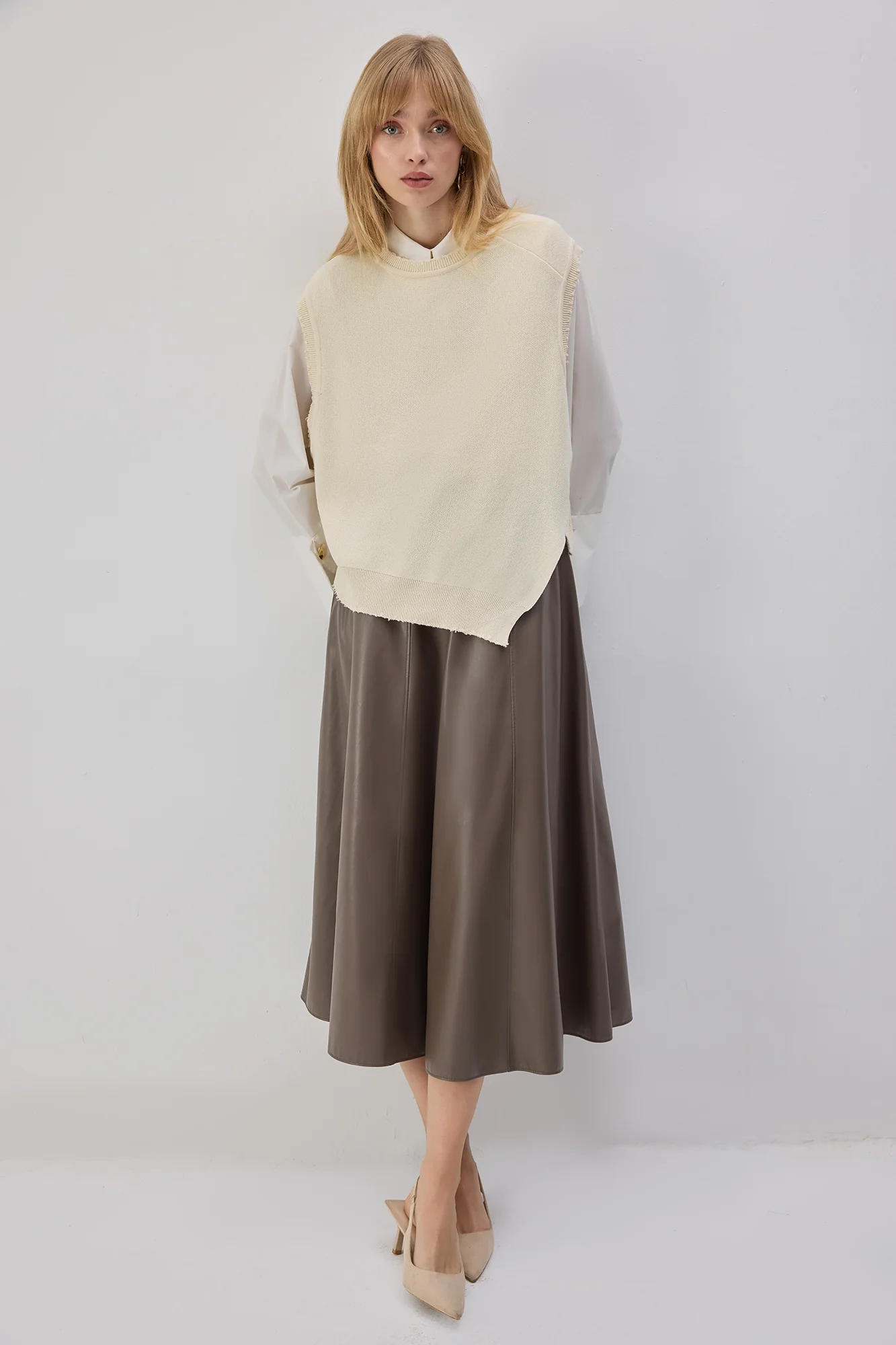 ASYMMETRICAL CUT KNIT SWEATER